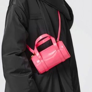 Brandon Blackwood  Pink Duffle Barrel bag